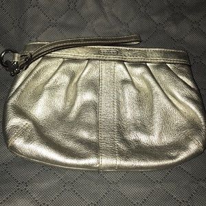 Coach wristlet / coins, lip stick, phone..